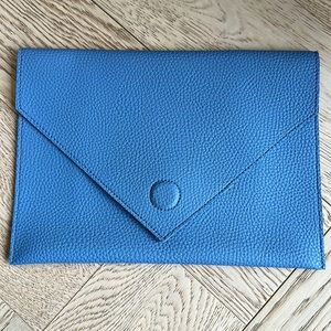 Blue leather envelope clutch